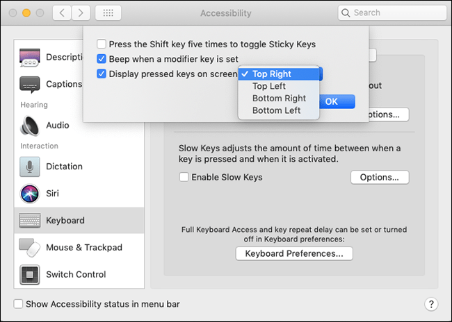 The Sticky Keys options screen with the checkbox and drop-down menu for Display pressed keys on screen highlighted