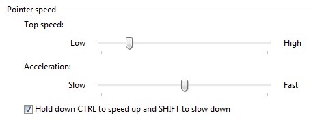 The Pointer Speed options with sliders labelled Top speed and Acceleration